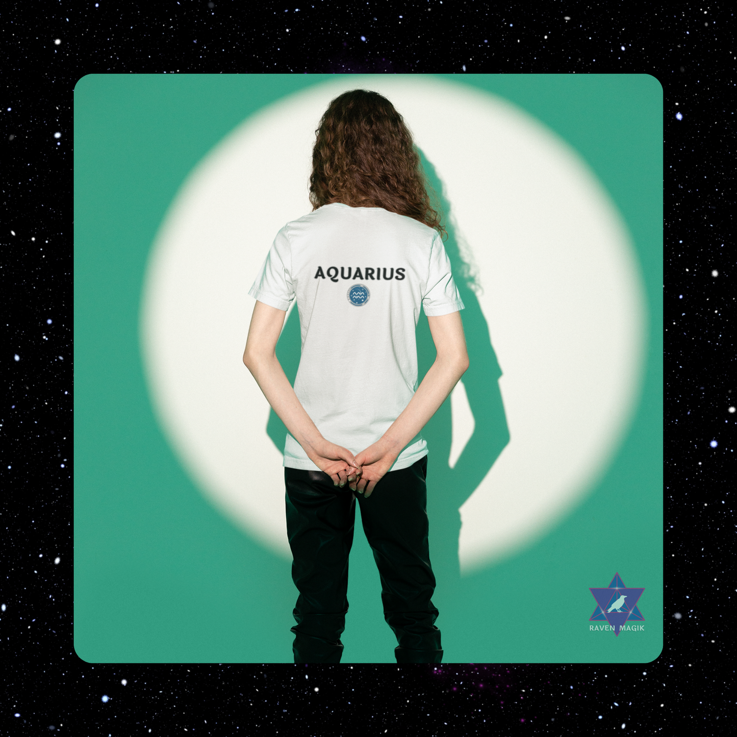 Person wearing a white 'Aquarius' t-shirt with a celestial background.