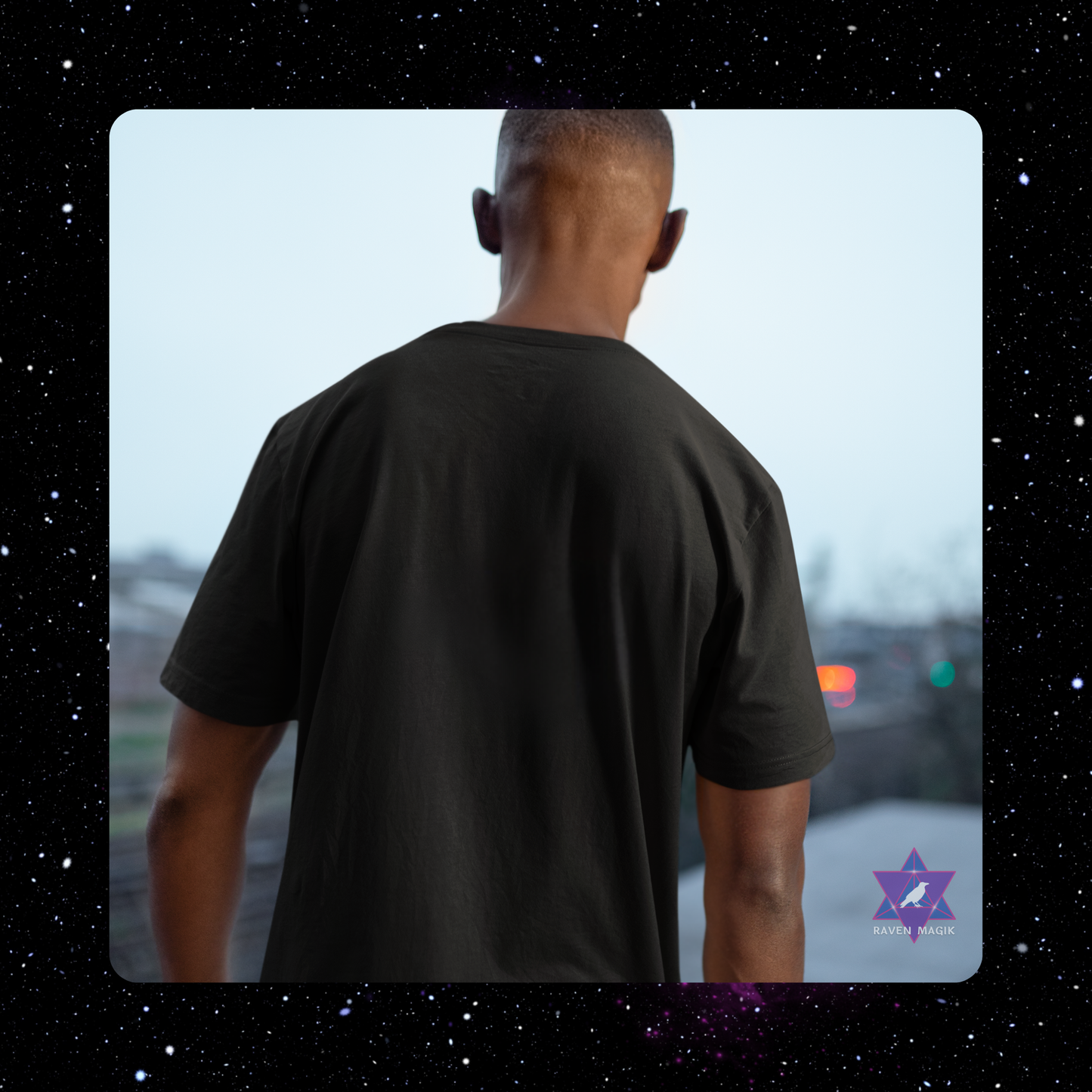 Man wearing a black t-shirt looking out a window with a starry night border.