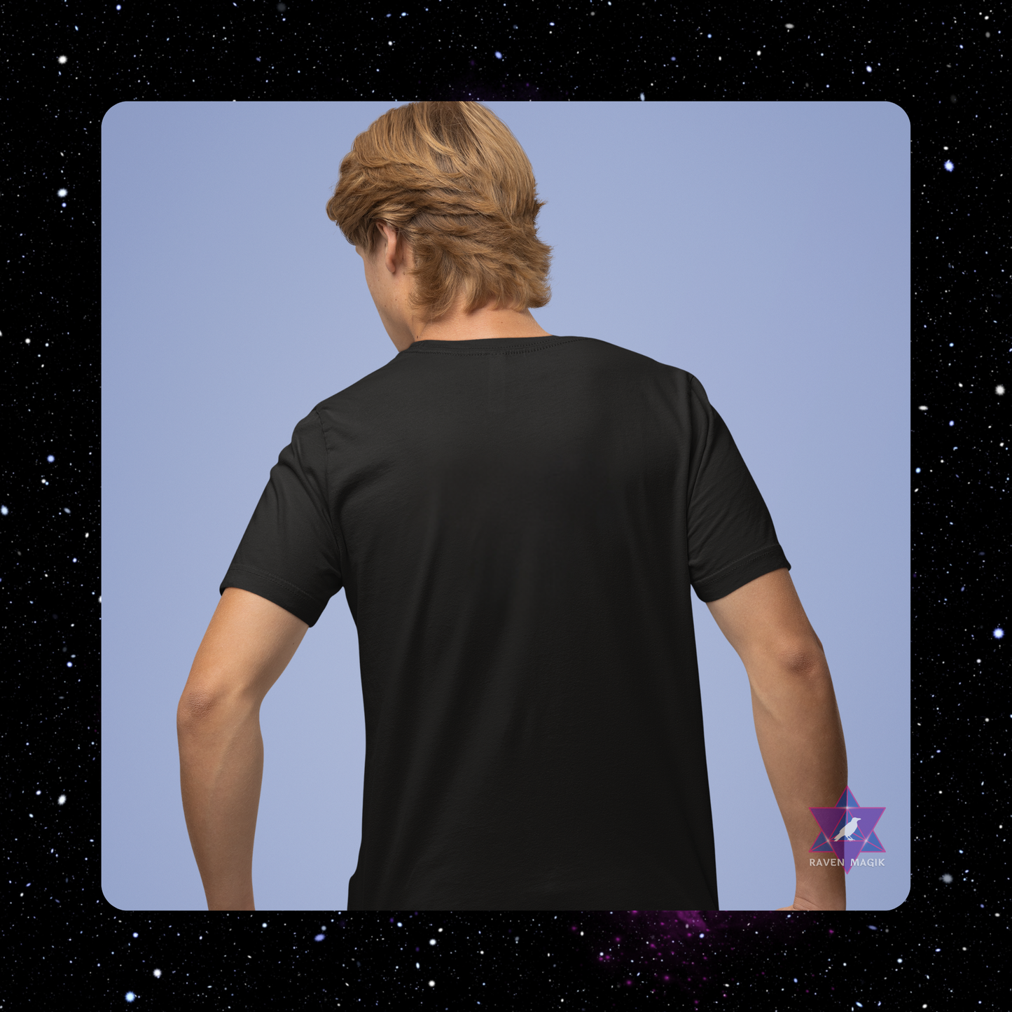 Person wearing a black t-shirt with a starry space background.