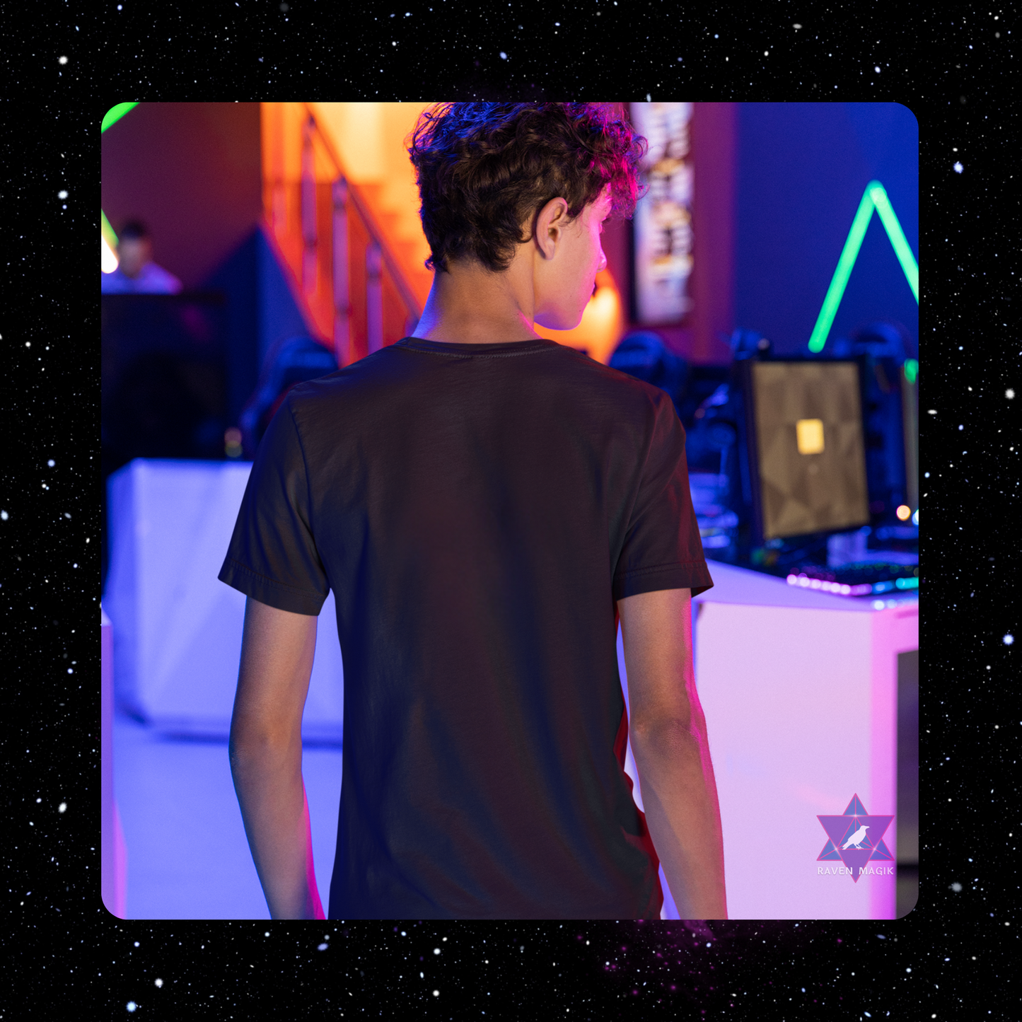 Person wearing a black t-shirt in a colorful, futuristic room with neon lights.