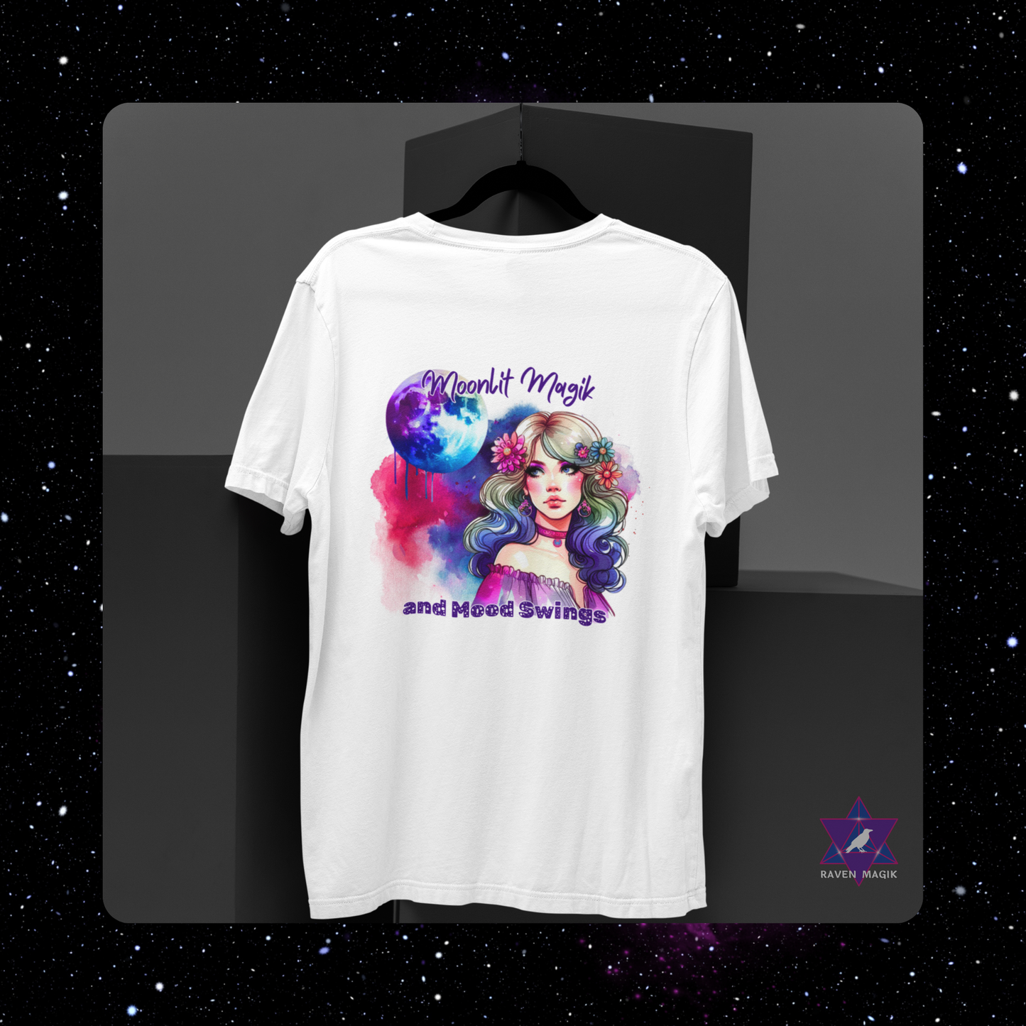 White t-shirt with a colorful graphic design of a woman with flowers in her hair on a black background. Cancer Zodiac T-shirt with “Moonlit Magik and Mood Swings” slogan, styled for intuitive, emotional energy.