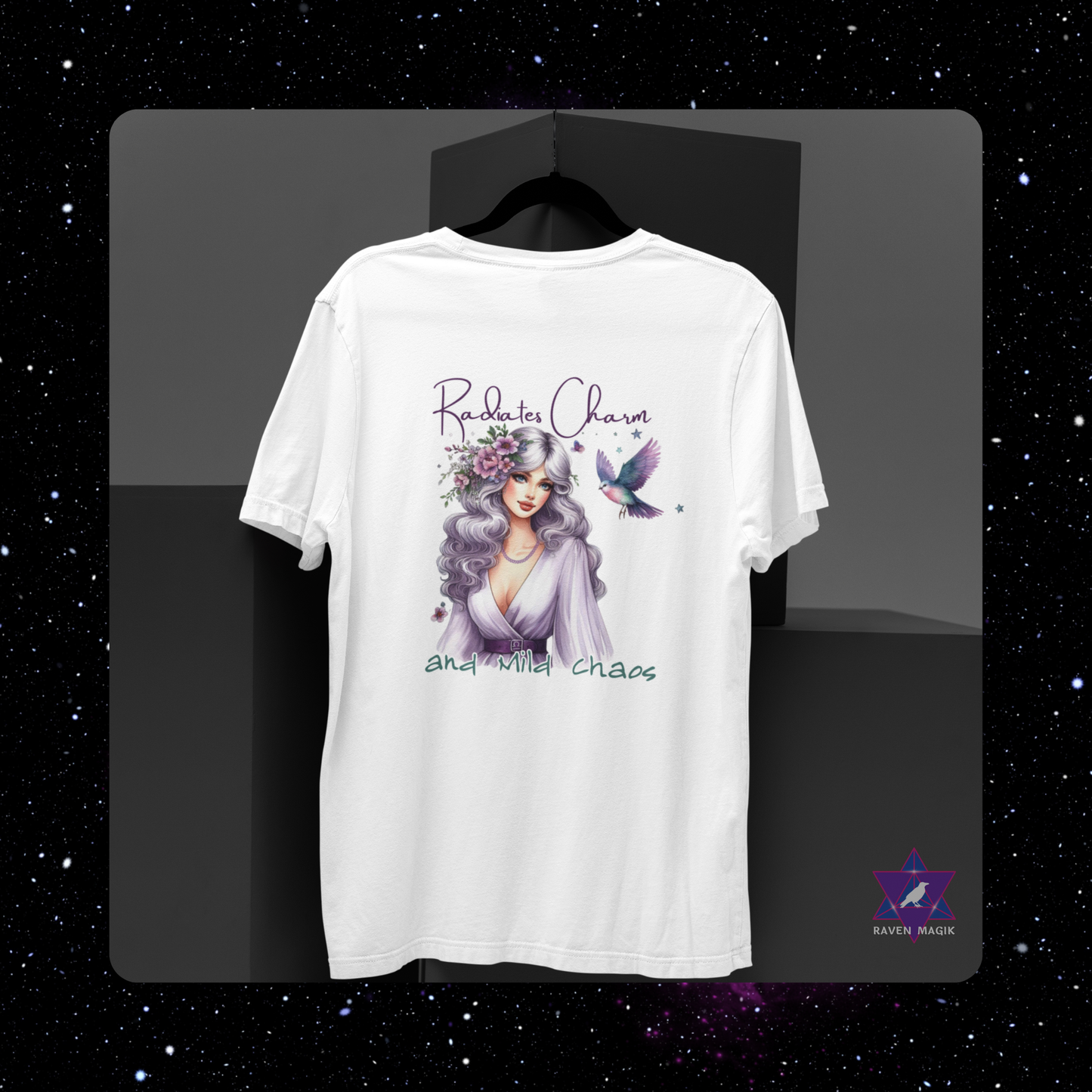 White t-shirt with a graphic design of a woman with purple hair and text on a black background. Libra Zodiac T-shirt with “Radiates Charm and Mild Chaos” slogan, styled for magnetic, balanced energy.