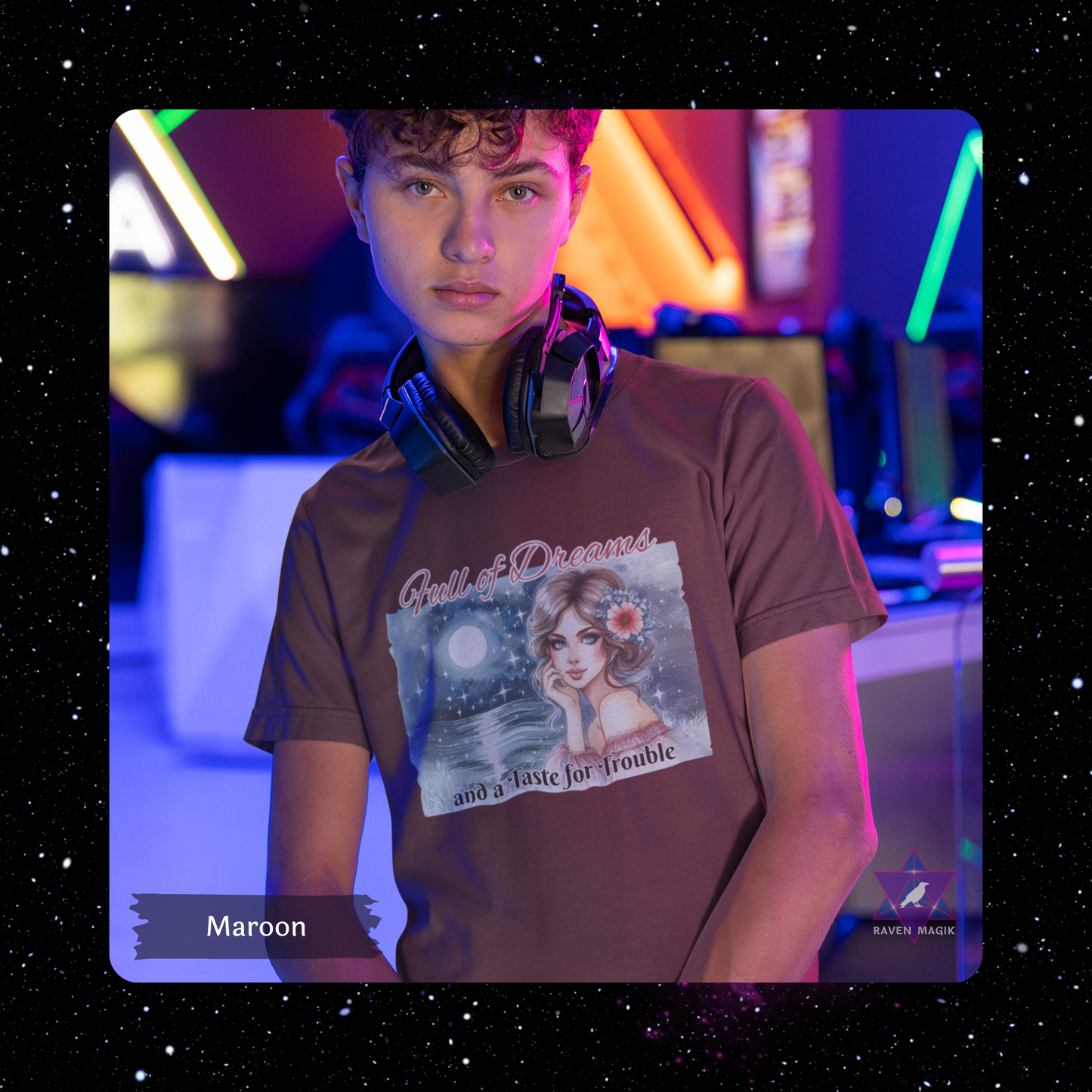 Person wearing a maroon t-shirt with a graphic design in a neon-lit setting. Pisces Archetype T-shirt with “Full of Dreams and a Taste for Trouble” slogan, styled for intuitive, whimsical energy and poetic rebellion.
