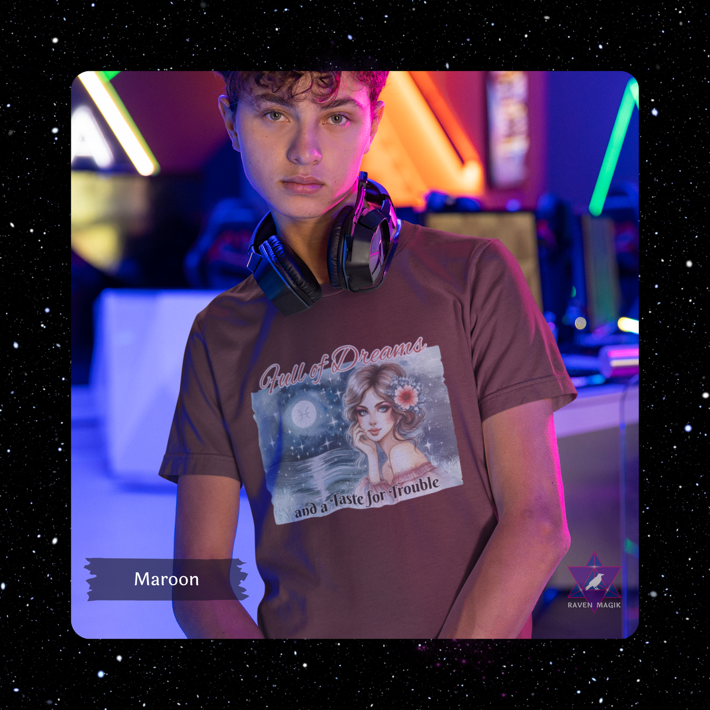Person wearing a maroon t-shirt with a graphic design in a colorful, possibly gaming or nightlife setting. Pisces Zodiac T-shirt with “Full of Dreams and a Taste for Trouble” slogan, styled for whimsical, empathic energy.