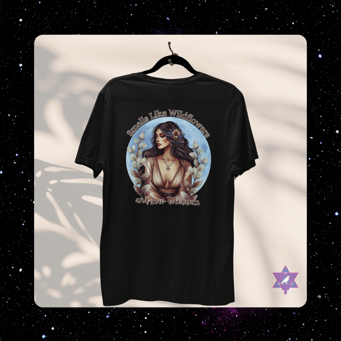 Black t-shirt with a graphic design of a woman and text on a white background. Taurus Archetype T-shirt with “Smells Like Wildflowers and Low Tolerance” slogan, styled for grounded, sensual energy and earthy elegance.