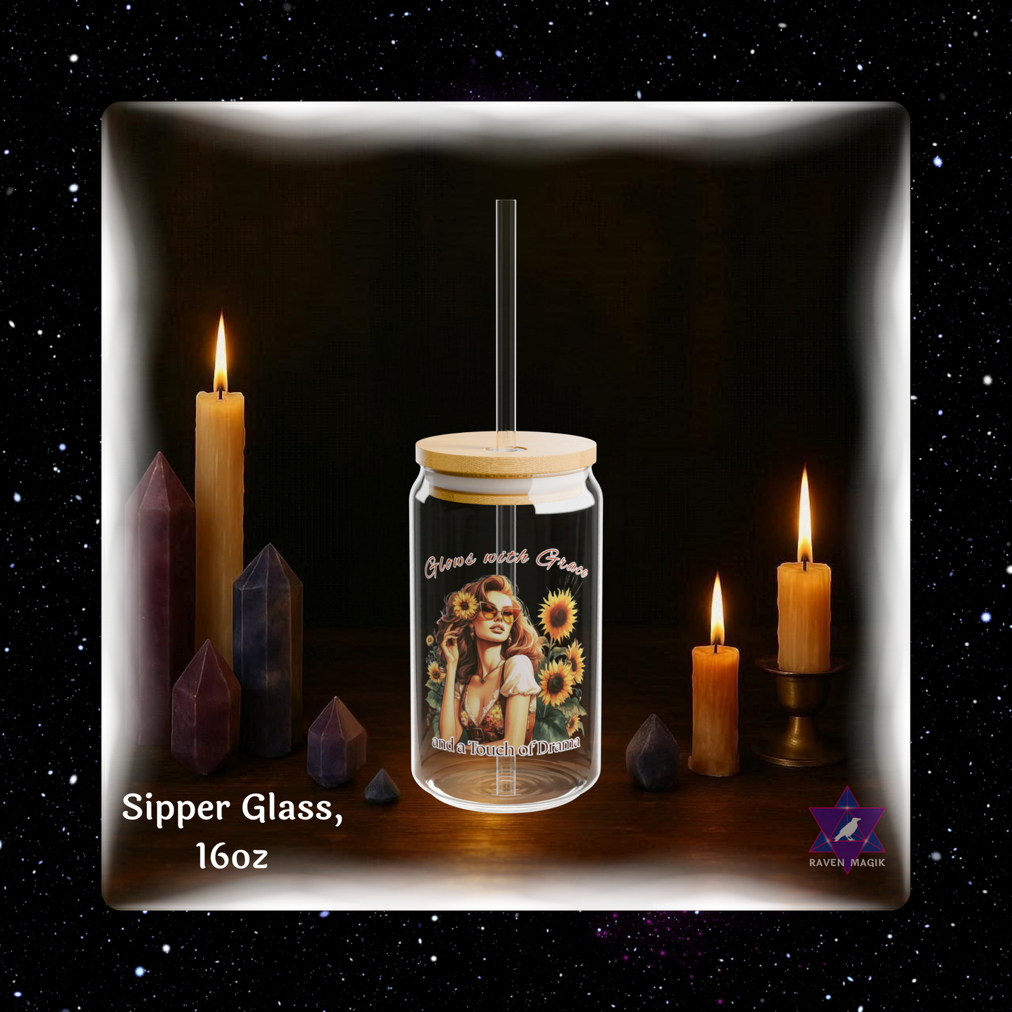 Glass sipper with design and text on a dark background with candles and crystals