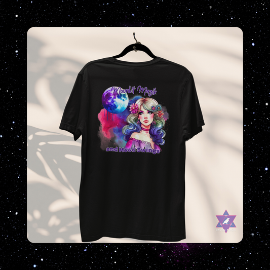 Black t-shirt with a colorful graphic design of a woman with rainbow hair and flowers, on a white background. Cancer Archetype T-shirt with “Moonlit Magik and Mood Swings” slogan, styled for intuitive, emotional energy and lunar mystique.