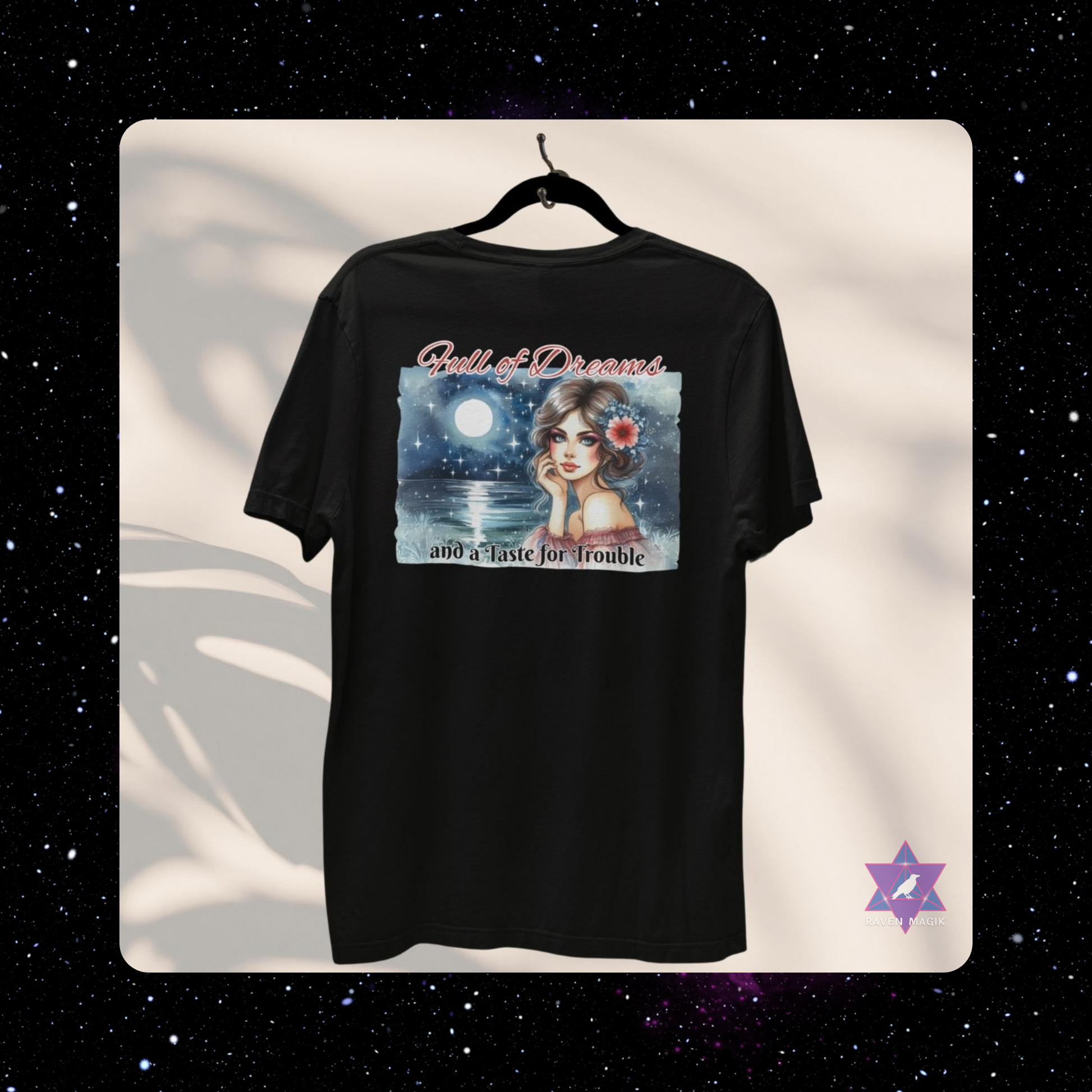 Black t-shirt with a graphic design of a woman with a flower in her hair against a starry background. Pisces Archetype T-shirt with “Full of Dreams and a Taste for Trouble” slogan, styled for intuitive, whimsical energy and poetic rebellion.
