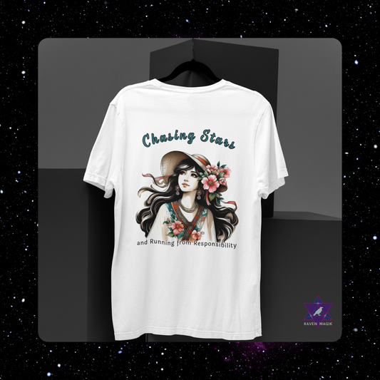 White t-shirt with a graphic design of a woman with flowers and text on a black background. Sagittarius Zodiac T-shirt with “Chasing Stars and Running from Responsibility” slogan, styled for wild, free-spirited energy.